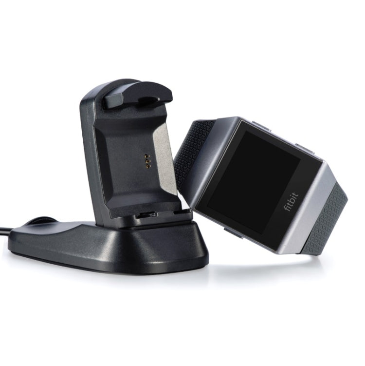 Black charging dock stand with watch in cradle and charging contacts