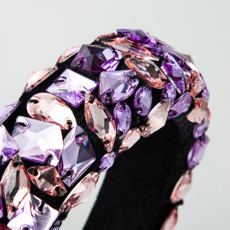 Close-up wide headband with faceted purple rhinestones and black base