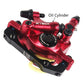 Red hydraulic disc brake caliper with oil port and mounting bolts, close-up view