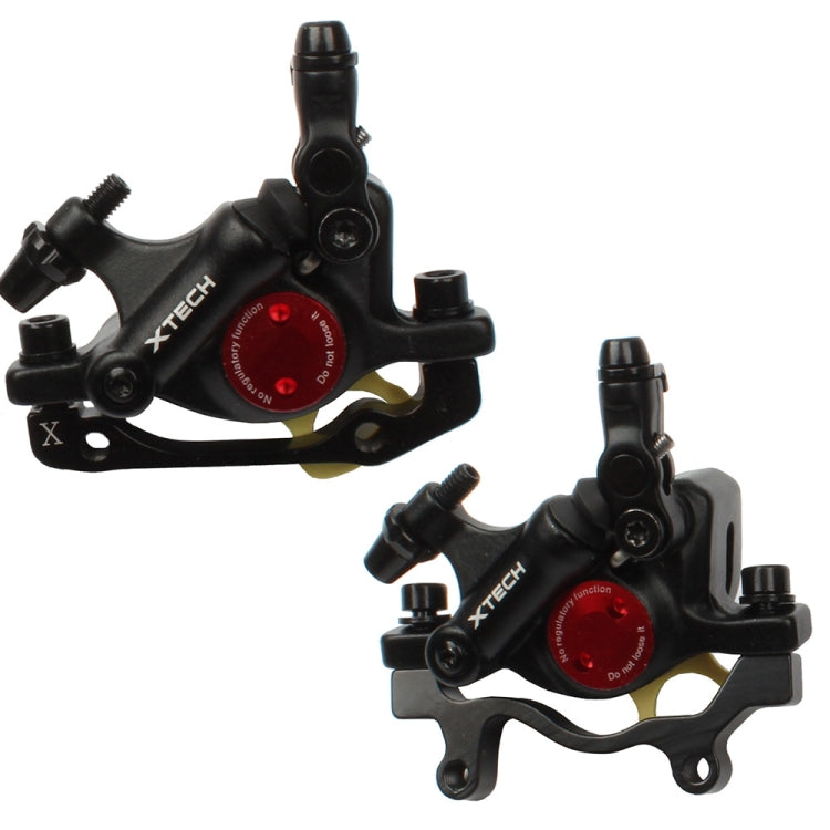 Pair of black hydraulic disc brake calipers with mounting brackets and hose ports