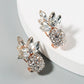 Clear rhinestone pineapple drop earrings with silver-tone sparkle settings