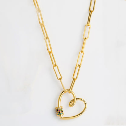 Gold-tone heart pendant necklace with small multicolor zircon detail on the charm