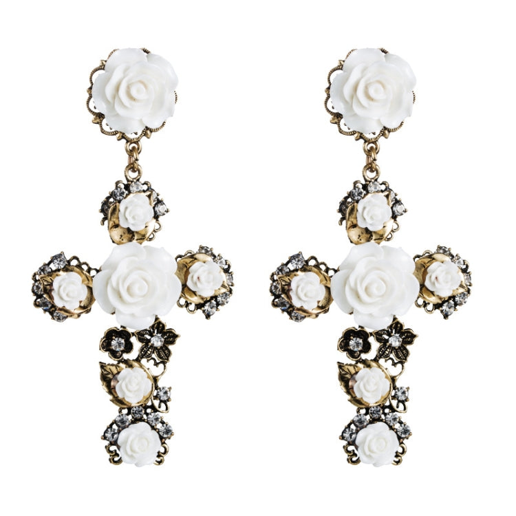 Pair of white rose cross long dangle earrings with gold-tone and rhinestone accents