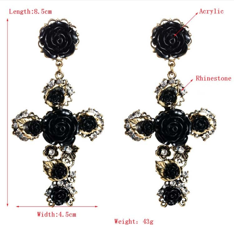 Pair of black rose cross long dangle earrings with rhinestones and gold-tone details