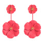 Pink/red triple-flower drop earrings with gold-tone centers, long dangling alloy design