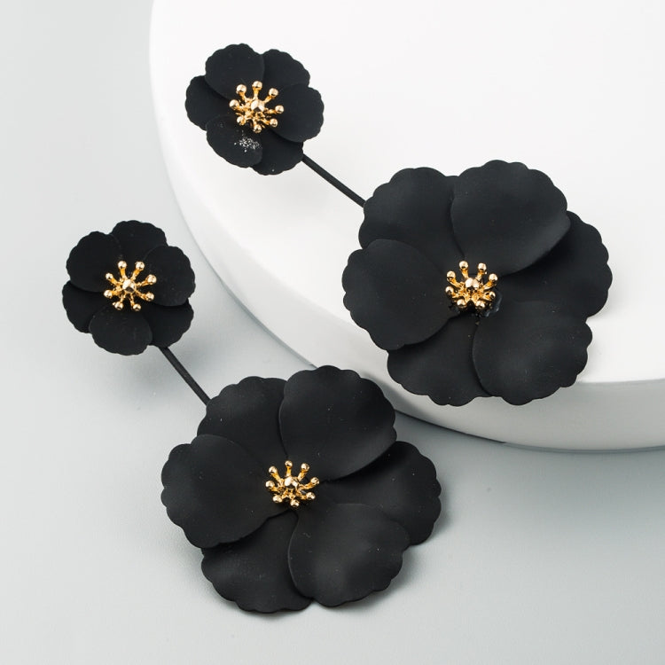 Black flower drop earrings with gold-tone centers, long dangling alloy design