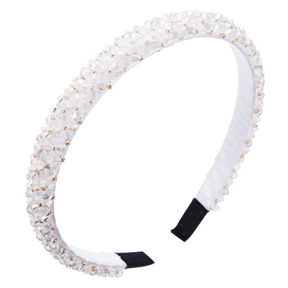 Crystal beaded fabric headband with white stones and black ends on a wide band