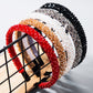 Multicolor crystal beaded fabric headband with black, white, red, and gold sections