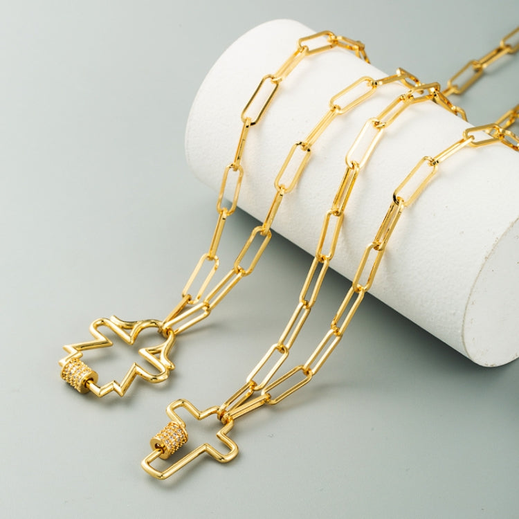 Gold-tone cross pendant necklace with two cross charms and zircon bands on link chain