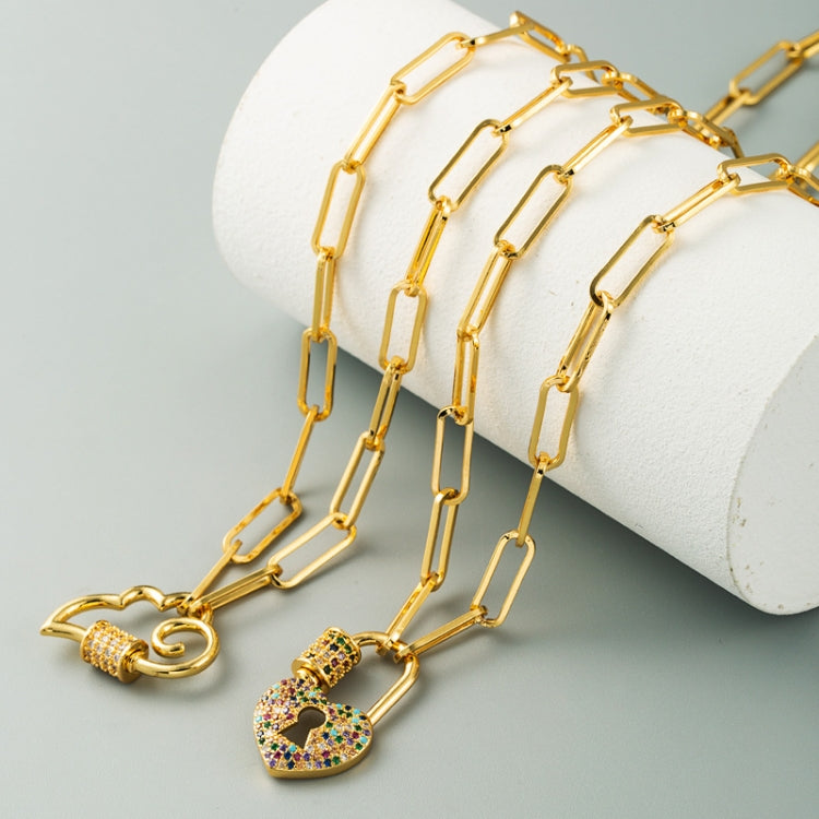 Gold-tone heart lock charm necklace showing link chain and multicolor zircon pendant