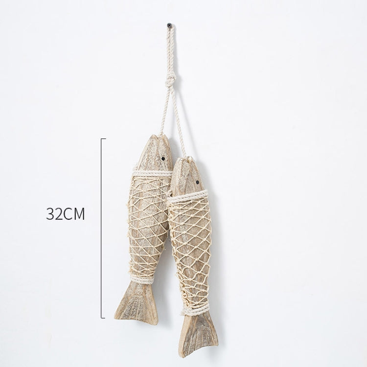 Pair of hanging wooden fish ornaments with twine rope and net-wrapped bodies