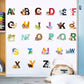 Alphabet animal wall stickers with colorful uppercase letters A–Z on a white wall