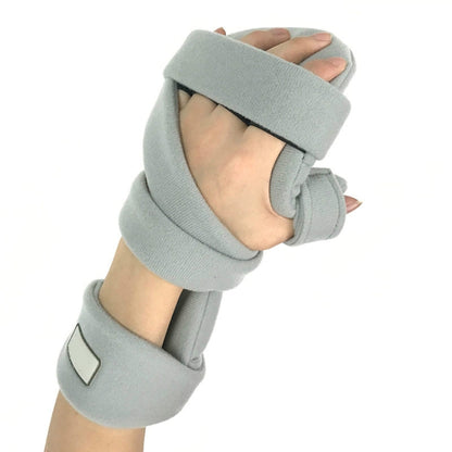 Adjustable wrist brace with padded finger rest for immobilizing hand and wrist