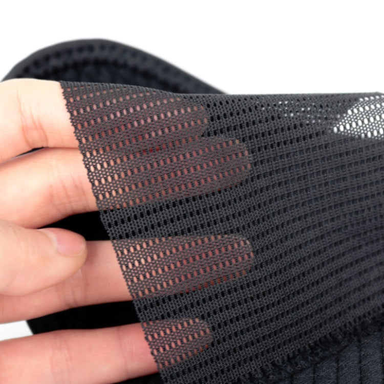 Black breathable mesh fabric section of thumb wrist brace