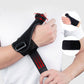 Black thumb wrist brace with adjustable strap worn on hand