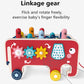 Red wooden percussion cart toy with linkage gears, patterned drum panel, and animal pegs
