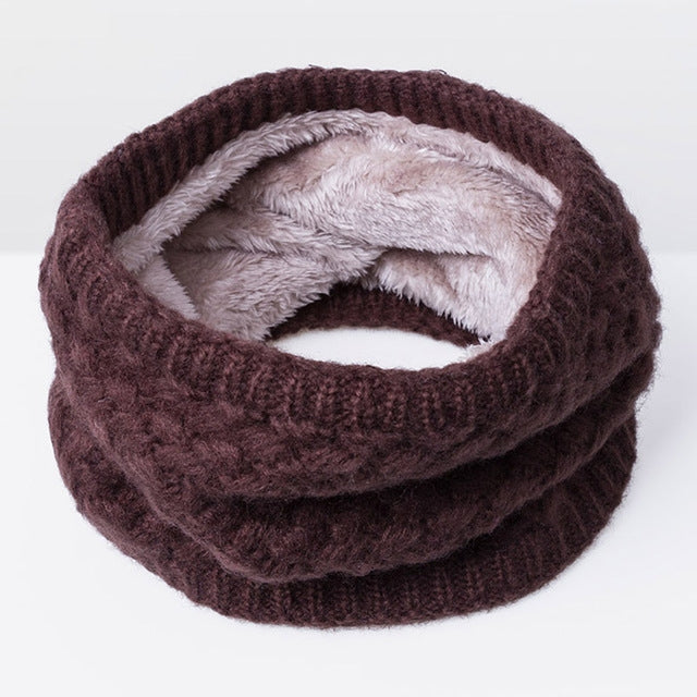 Dark brown knit infinity scarf with thick ribbed texture and soft gray fleece lining