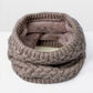 Khaki beige knit infinity scarf with thick ribbed texture and soft gray fleece lining