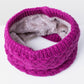 Hot pink knit infinity scarf with thick ribbed texture and soft gray fleece lining