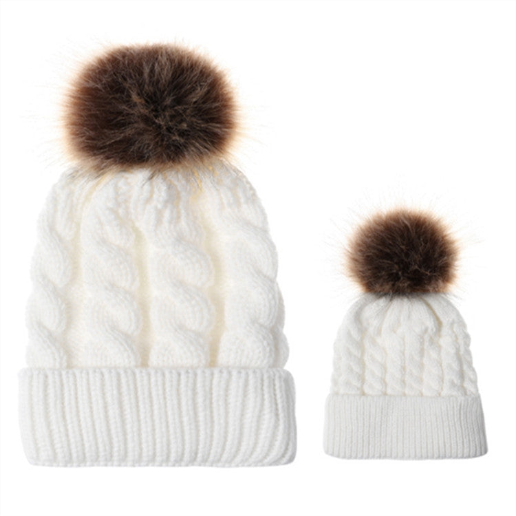 Parent-child knit beanie set in white/ivory with brown faux-fur pom pom tops