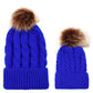 Parent-child knit beanie set in bright blue with brown faux-fur pom pom tops