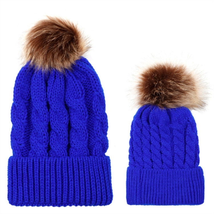 Parent-child knit beanie set in bright blue with brown faux-fur pom pom tops