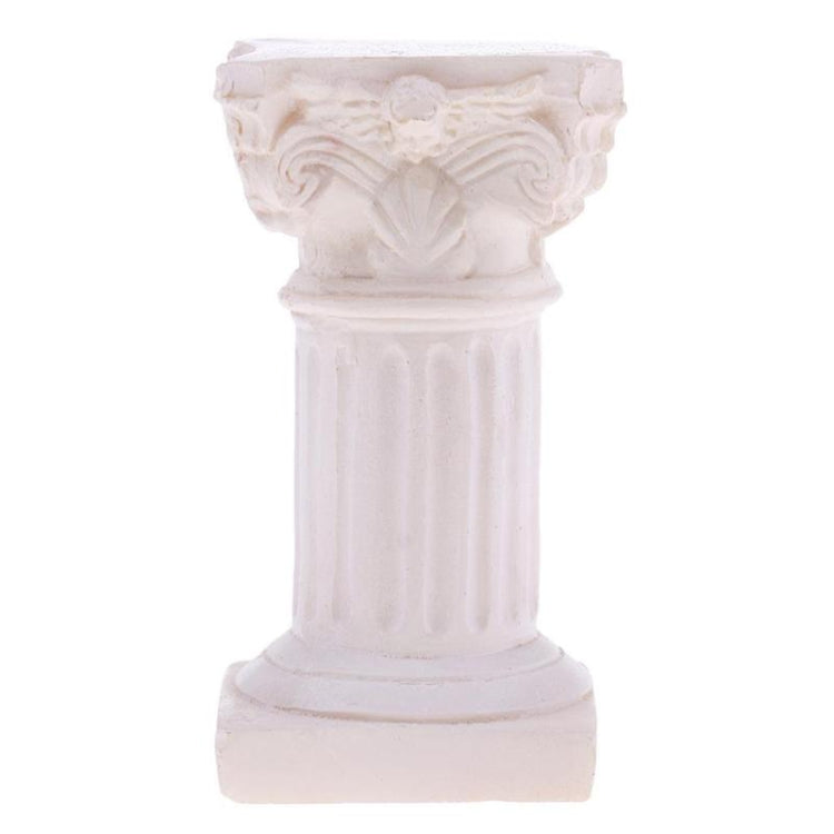 Cream Roman column pillar with carved scroll capital and vertical fluted shaft