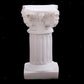 Cream Roman column pedestal with carved top capital and fluted vertical column
