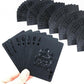 Waterproof plastic playing cards set, hand holding dark deck with ornate crest