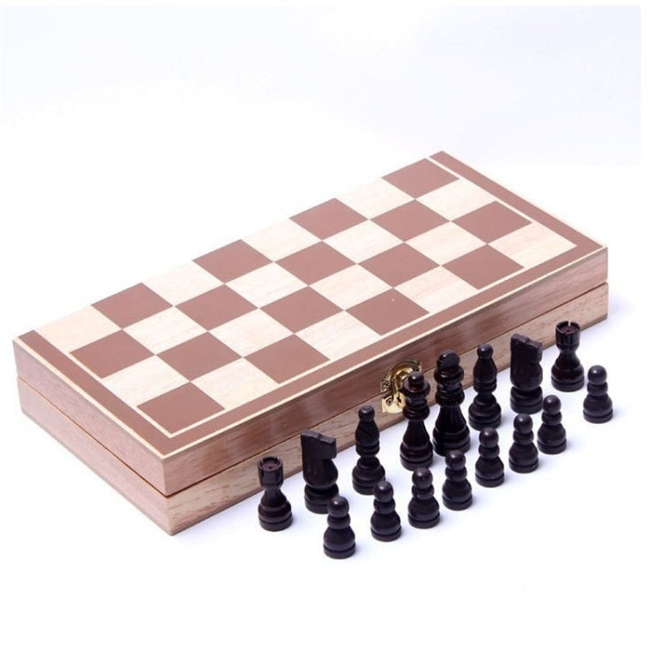 Wooden folding chessboard closed with chess pieces stored in the compartments