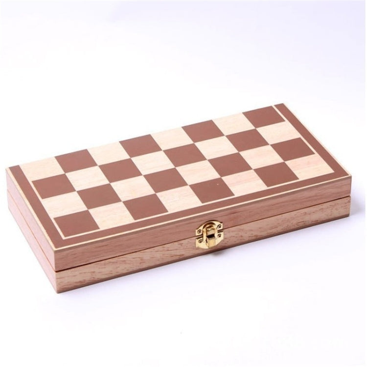 Closed wooden folding chessboard with brass latch and brown-and-cream checkered top