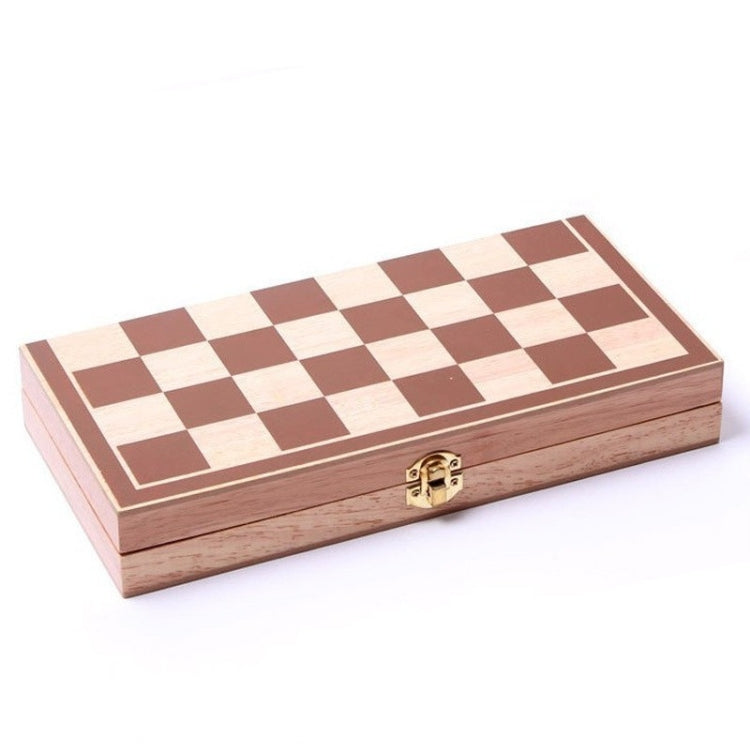 Closed wooden folding chessboard with brown-and-cream checkered top and brass latch