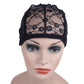 Black lace mesh hair net cap with floral lace top panel, worn on mannequin head