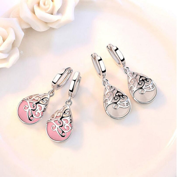 Sterling silver hoop drop earrings with teardrop pendant and pink enamel-style accents.