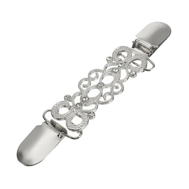 Silver decorative sweater collar clip with filigree oval links and small rhinestones