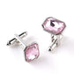 Silver-tone French cufflinks with light pink octagon zircon stones, hinged bar backs.