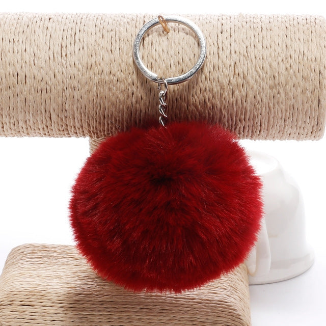 Red faux rabbit fur pompon keychain with silver metal ring and clasp