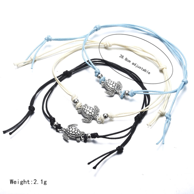 Wax string anklets with sea turtle charms in black and light blue, adjustable cords
