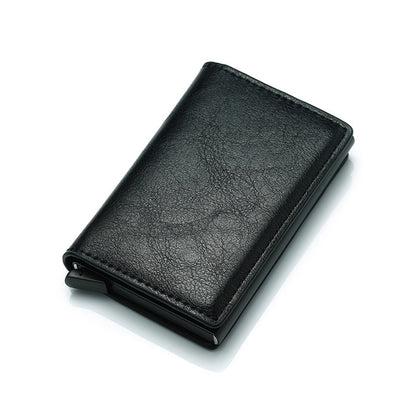 Black leather card wallet with elastic band and slim metal edge, front view