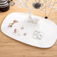 White antler jewelry display tray with rings, earrings, and necklace hooks on base