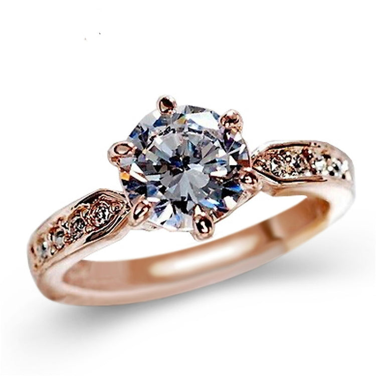 Rose gold six-claw crystal solitaire ring with engraved band