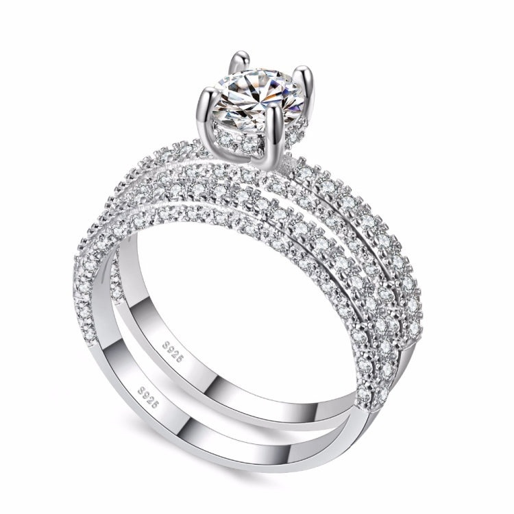 Cubic zirconia wedding ring set with double-row pavé band and round solitaire