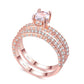 Rose gold cubic zirconia double-row bridal ring with round center stone