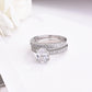 Cubic zirconia engagement ring with oval center stone and double-row band