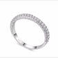 Silver-toned double-row cubic zirconia wedding band viewed from the side