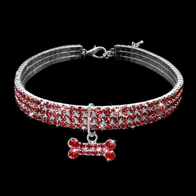 Red rhinestone dog collar with silver buckle and hanging crystal bone charm for small dogs
