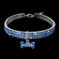 Blue crystal dog collar with silver buckle and center bone charm, sparkling all around