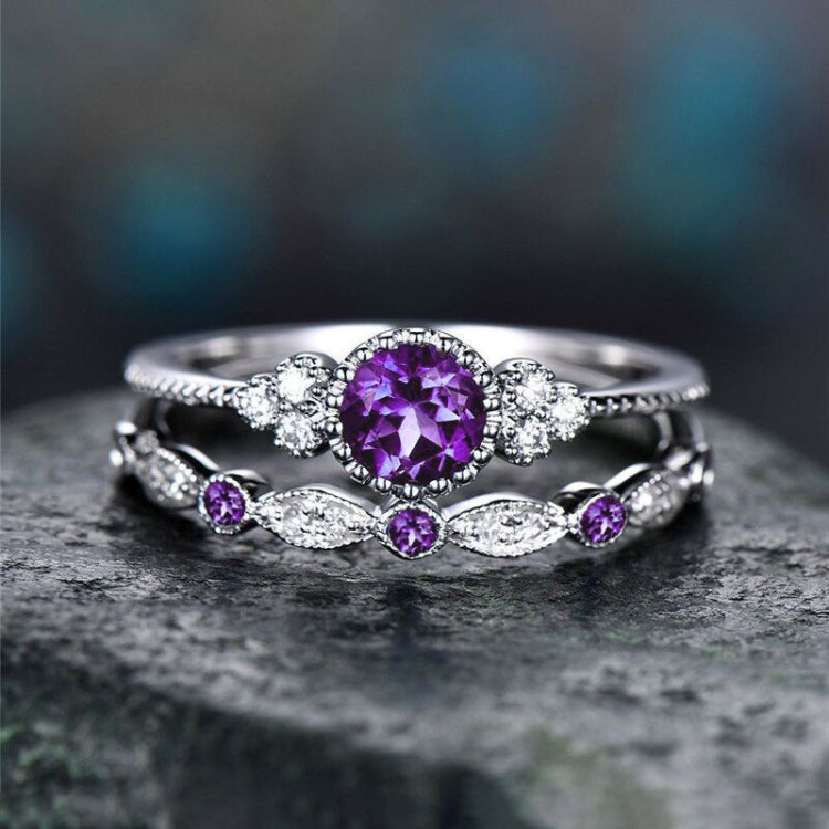 Two-piece women's zircon ring set with purple round center and matching purple side stones