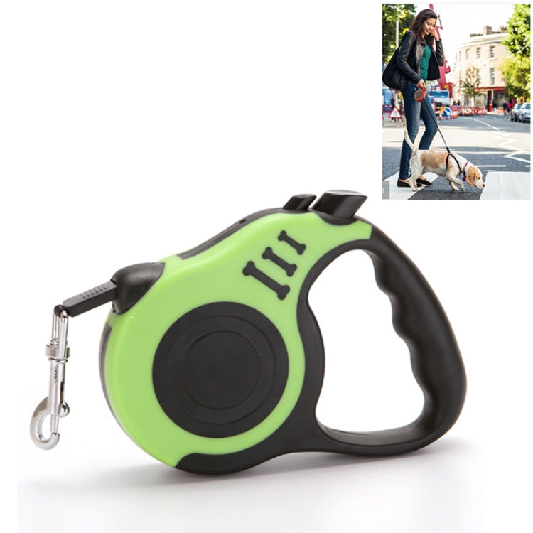 Retractable dog leash with green housing and black handle, metal snap hook