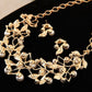 Gold leaf wedding jewelry set with faux-pearl drops, crystal leaves, necklace and earrings